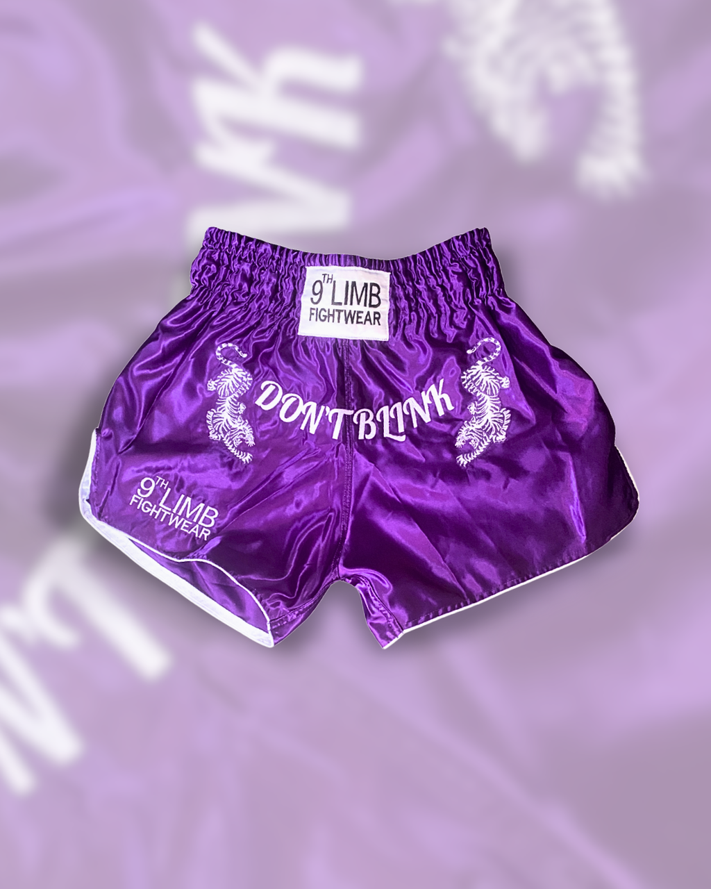 Purple 9th Limb „Don’t Blink“ Muay Thai Shorts – Satin Fightwear