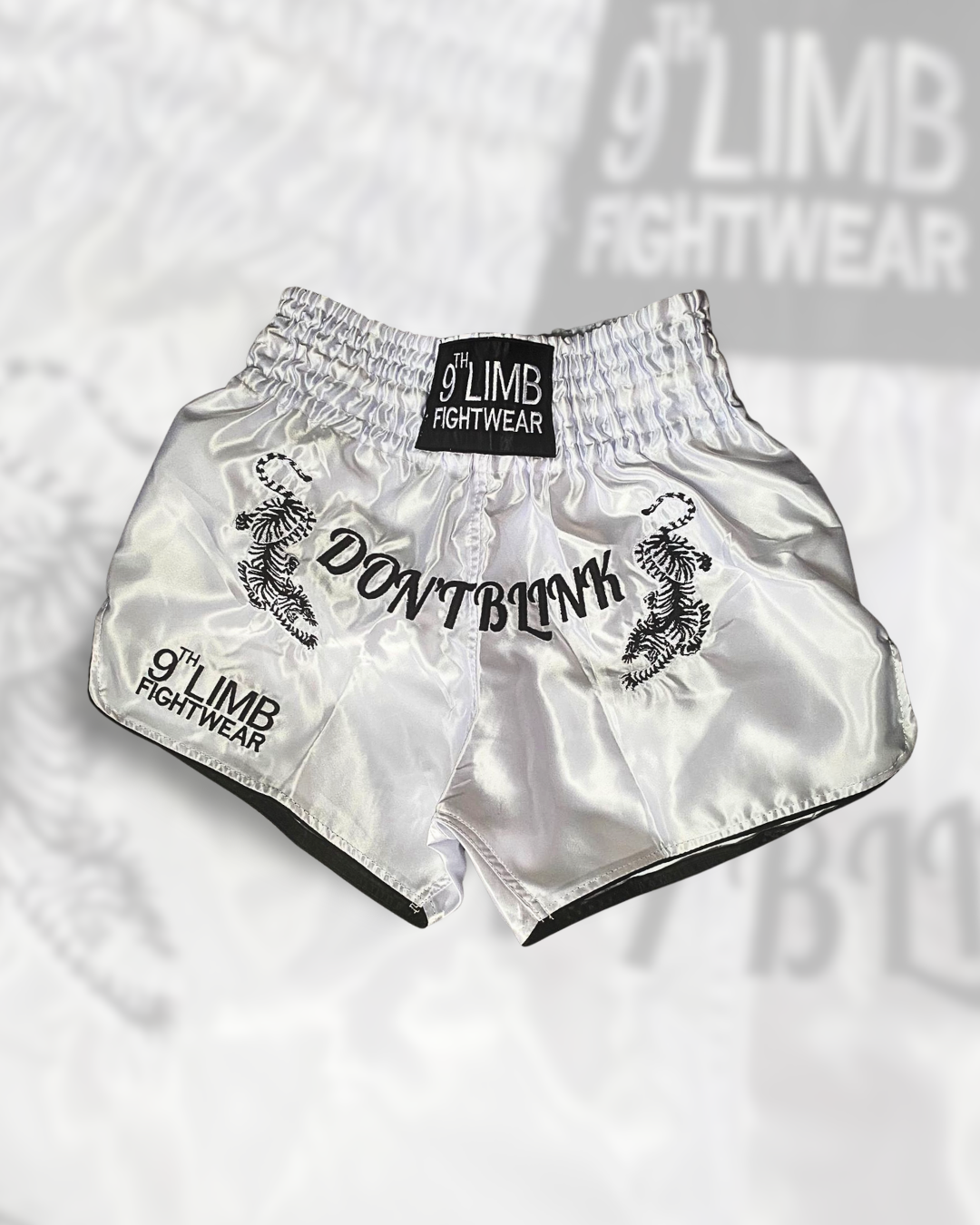 White 9th Limb “Don’t Blink” Muay Thai Shorts – Satin Fightwear