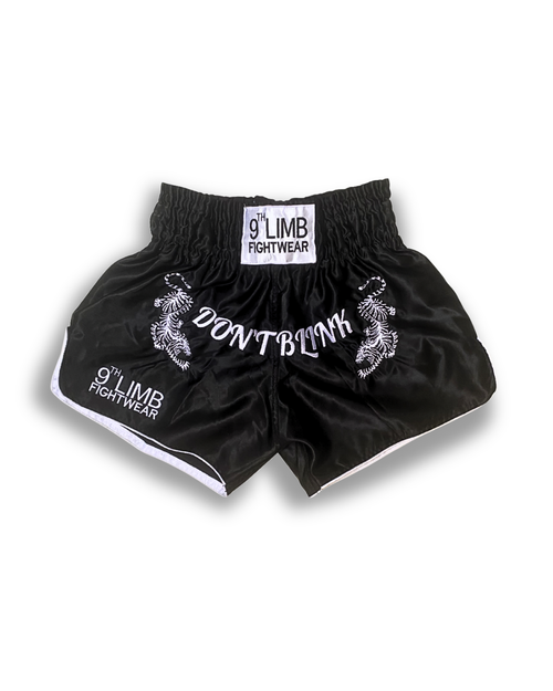 Black 9th Limb “Don’t Blink” Muay Thai Shorts – Black Satin Fightwear